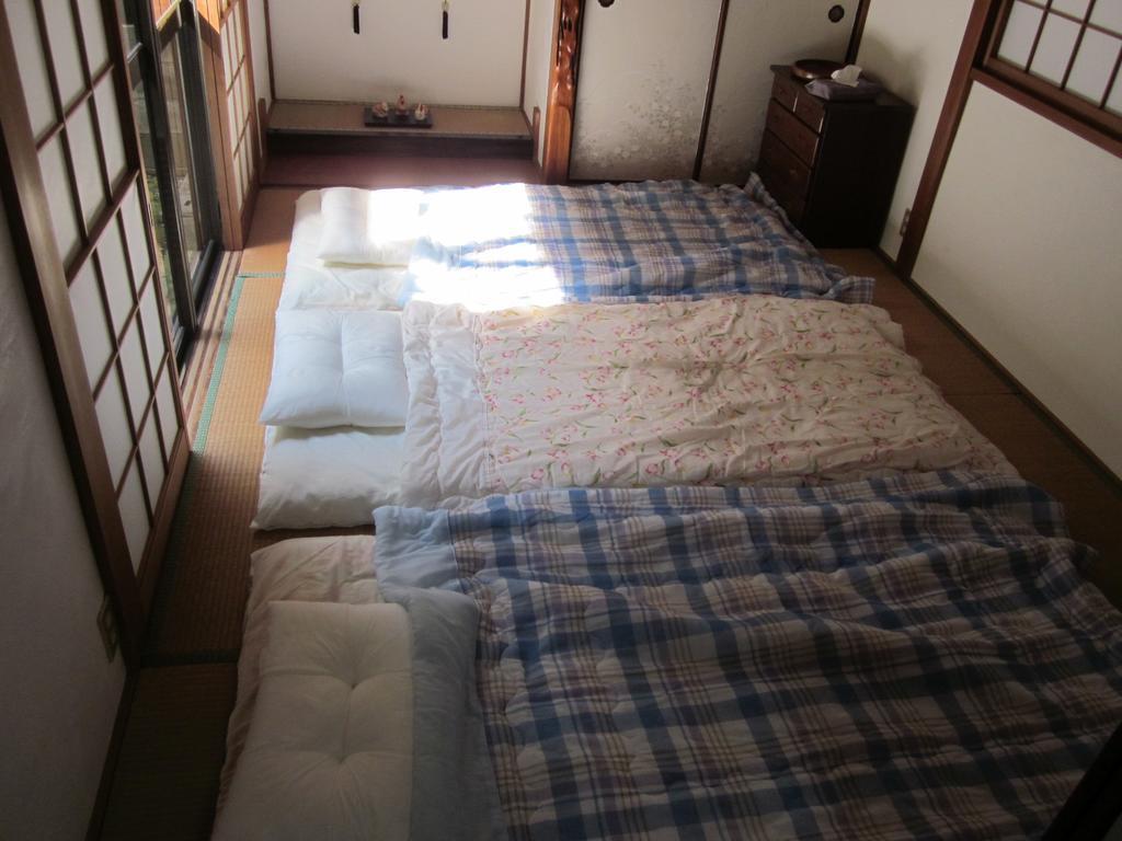 Enman Guest House Osaka Moriguchi Zewnętrze zdjęcie